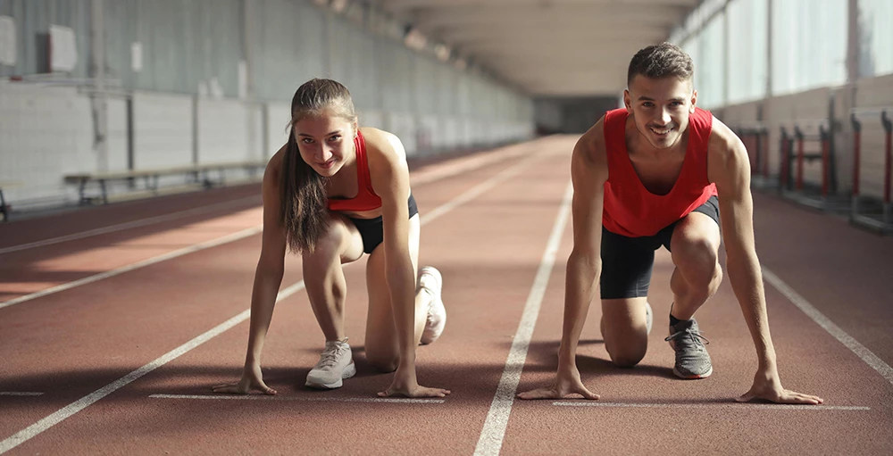 student athletes ready to run on track